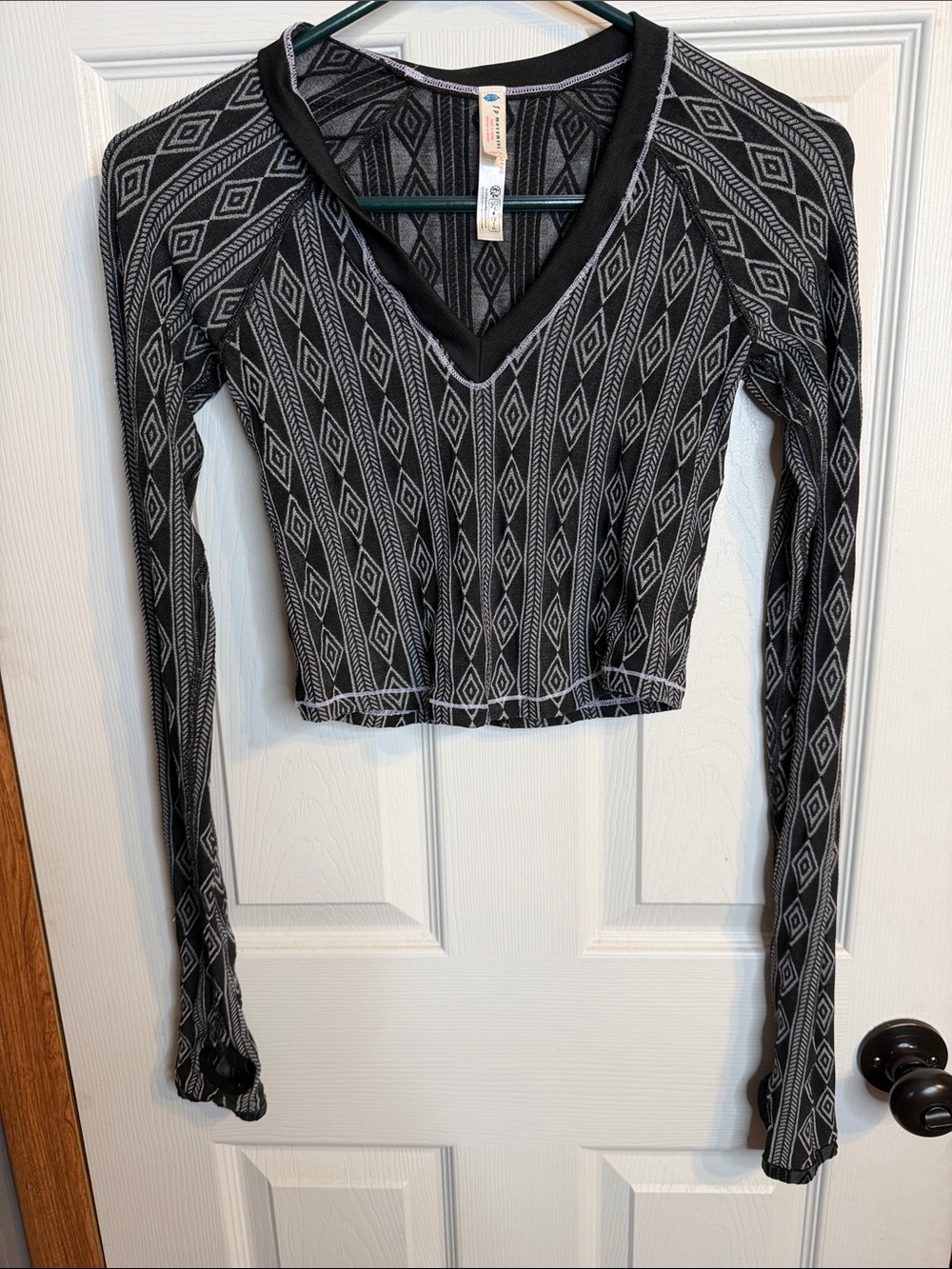 Black Geometric V‑Neck Long Sleeve Crop Top FP Movement
